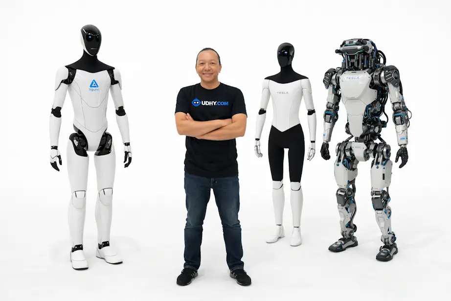 Humanoid Robots 2026: Figure, Tesla & Atlas Guide Three humanoid robots — Figure AI, Tesla Optimus, and Boston Dynamics Atlas — standing apart on a white background, representing the 2026 robotics innovation landscape.